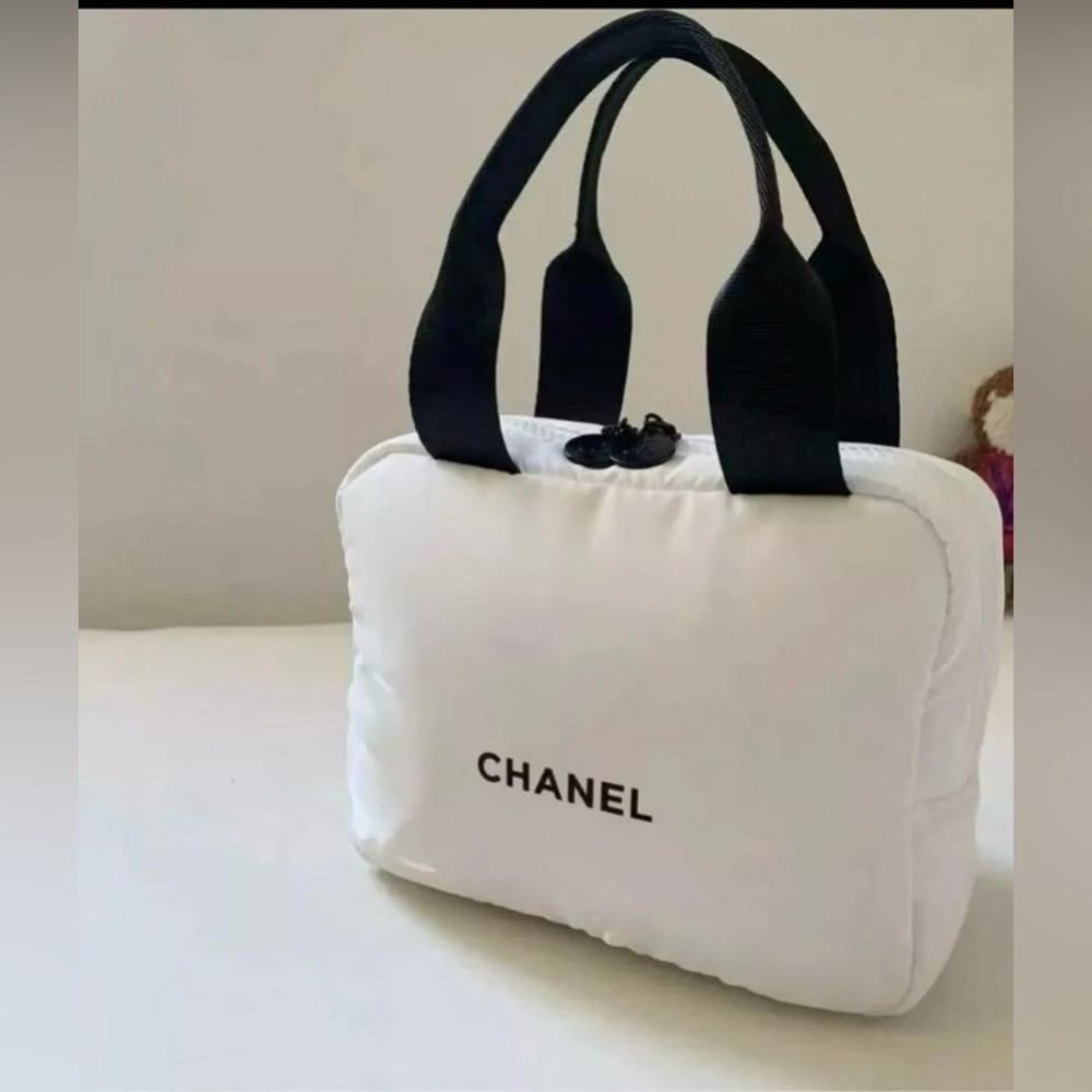 Chanel cosmetic white puff bag